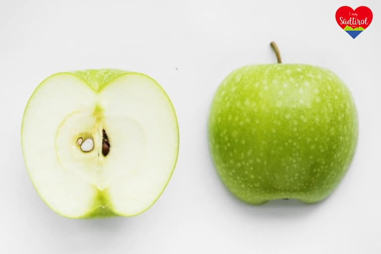 macro-shot-green-apple-isolated-white-background